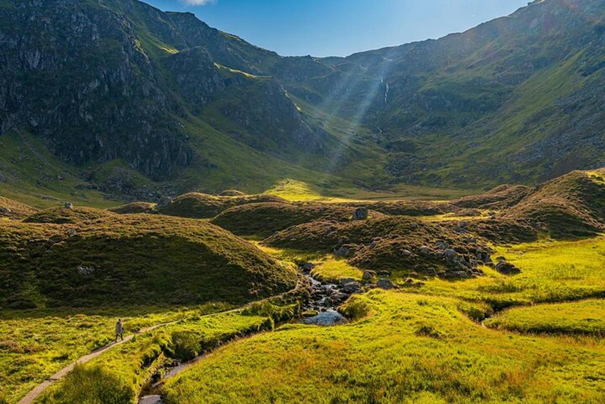 a view of a mountain valley with a river