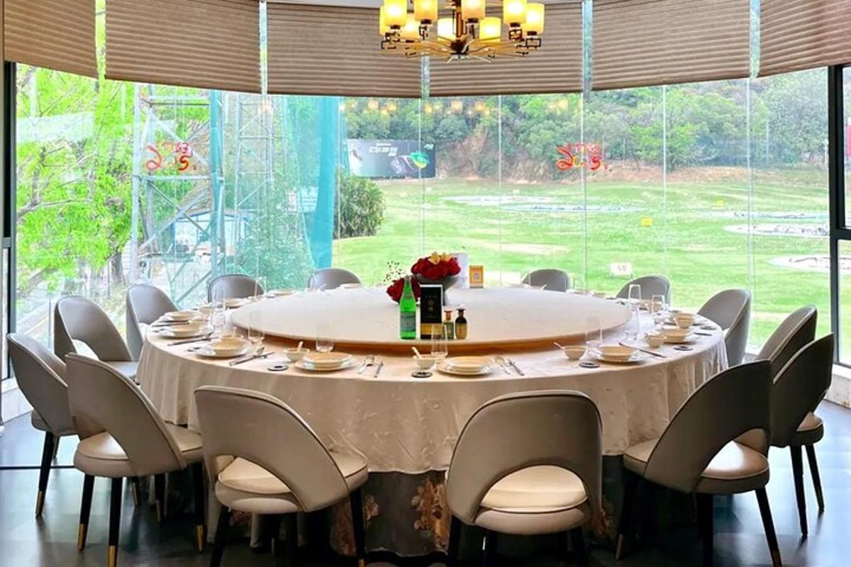 a large dining room table with chairs and a large window
