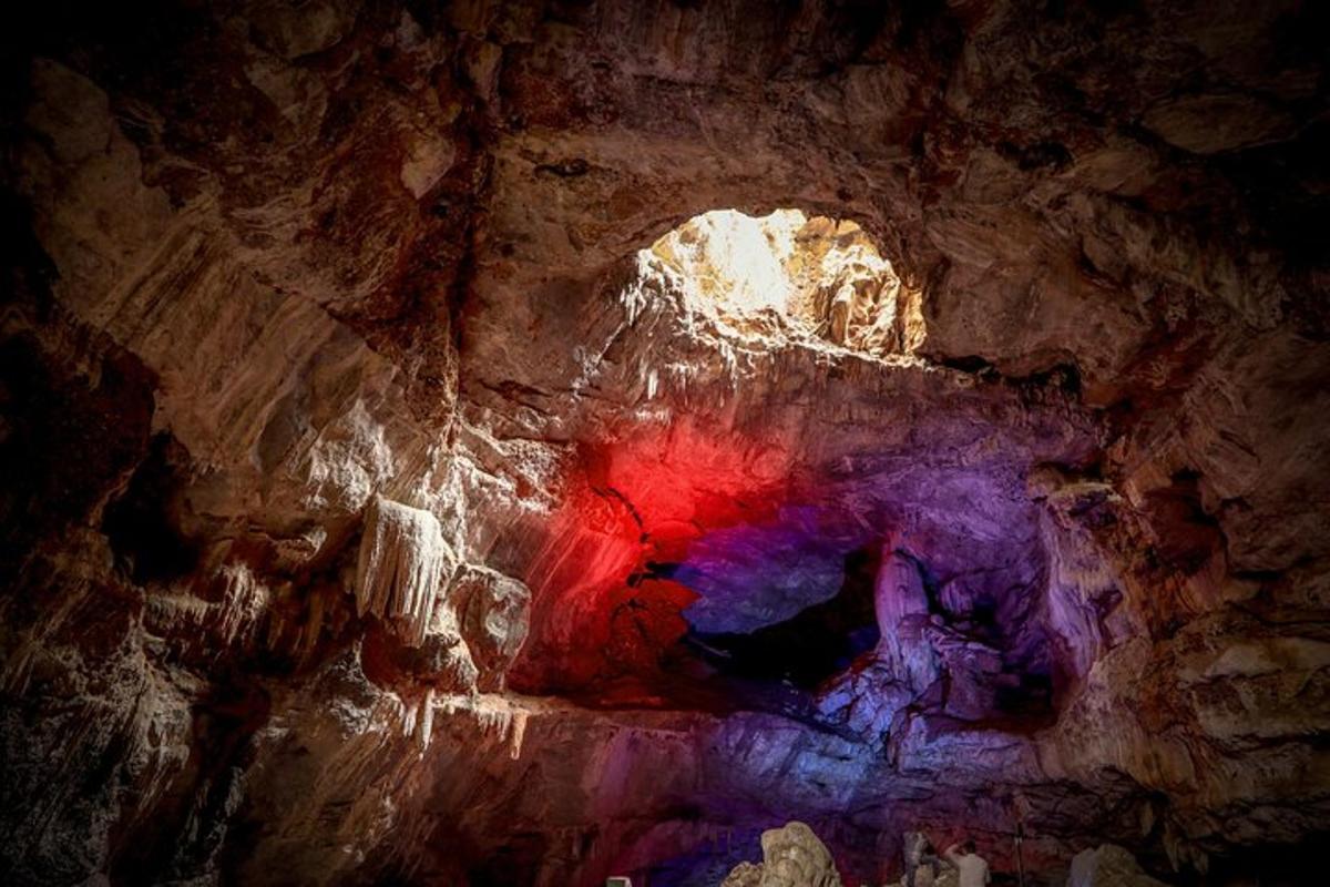 a cave with a red and purple substance in it