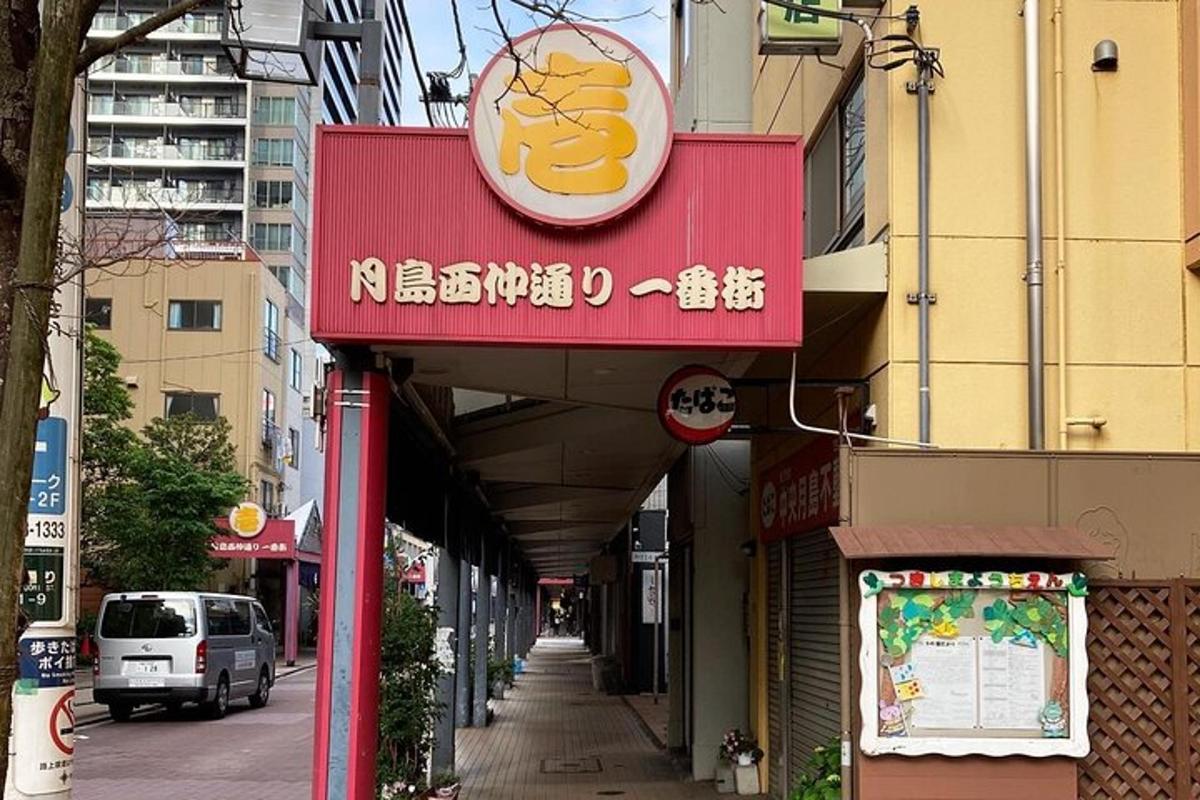 a building with a sign on the side of a street