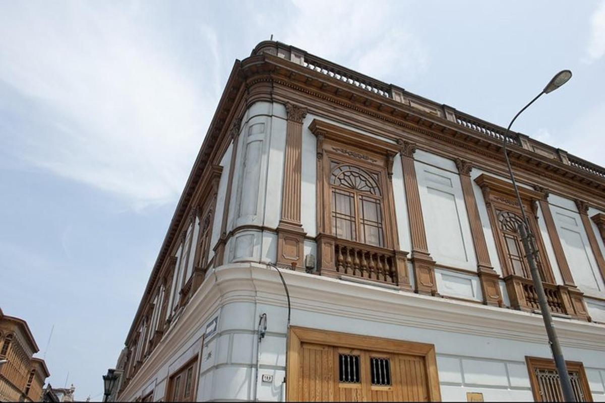 a white building with a brown and white