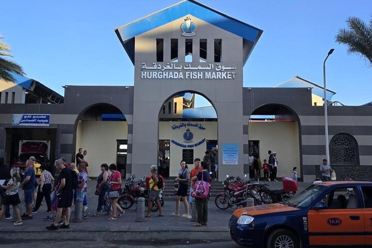 a group of people standing in front of a building