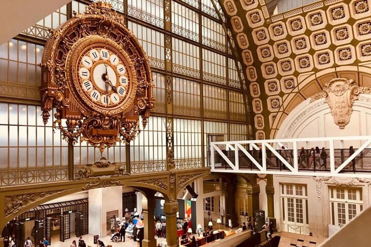 a large clock hanging from the ceiling of a building