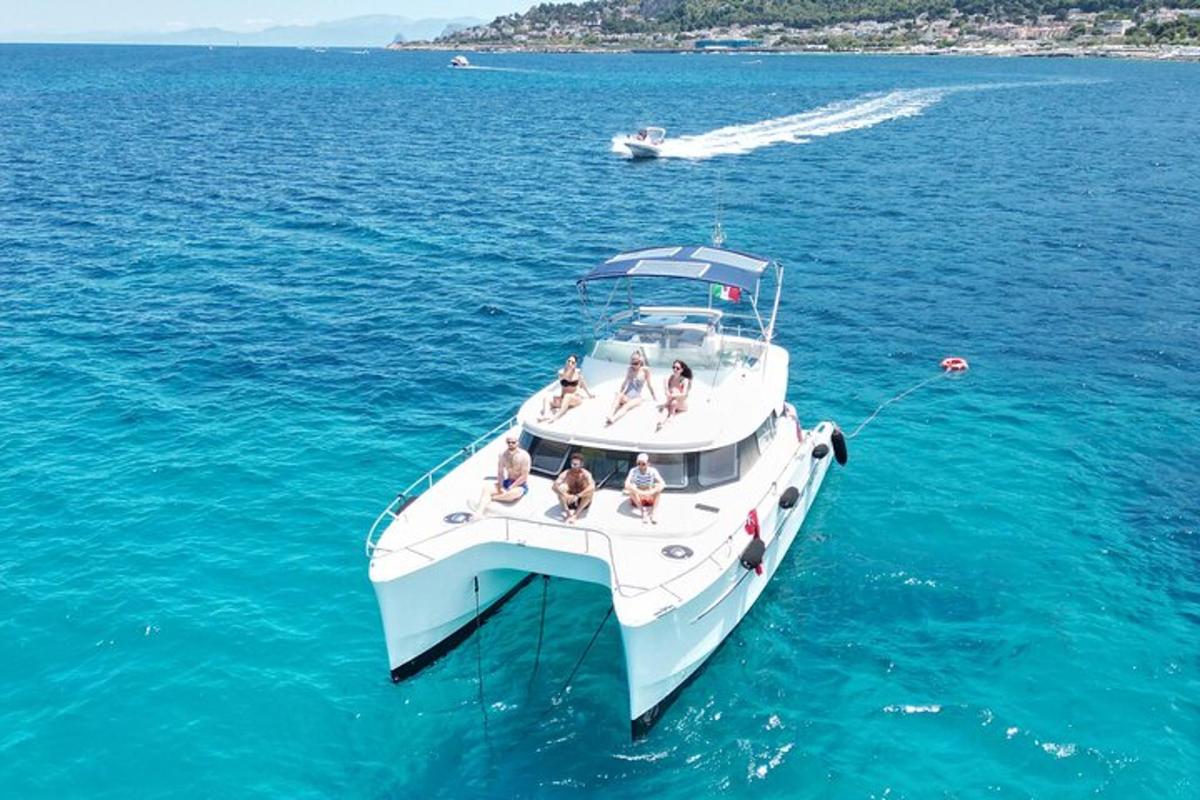 a group of people on a boat in the water