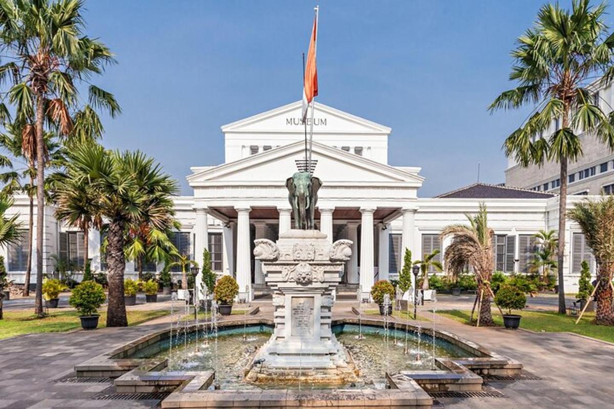 a building with a fountain in front of a building