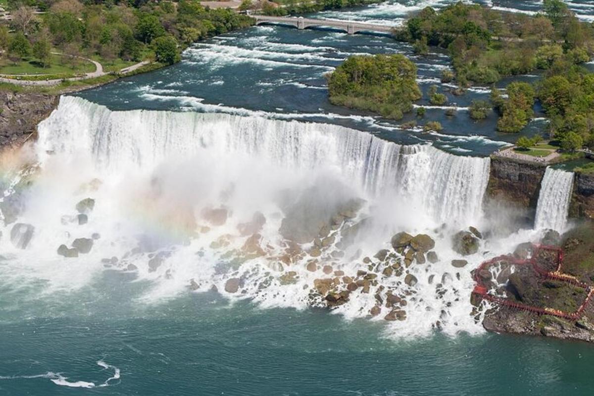 an aerial view of a waterfall in a river
