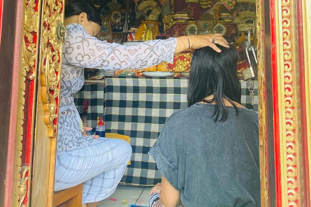 a woman looking at her reflection in a mirror