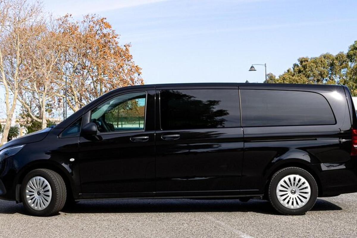 a black van parked in a parking lot