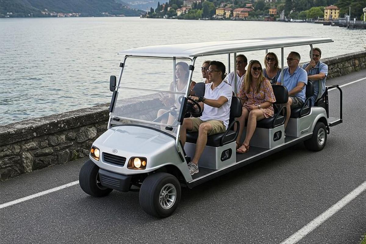 a group of people riding in a golf cart