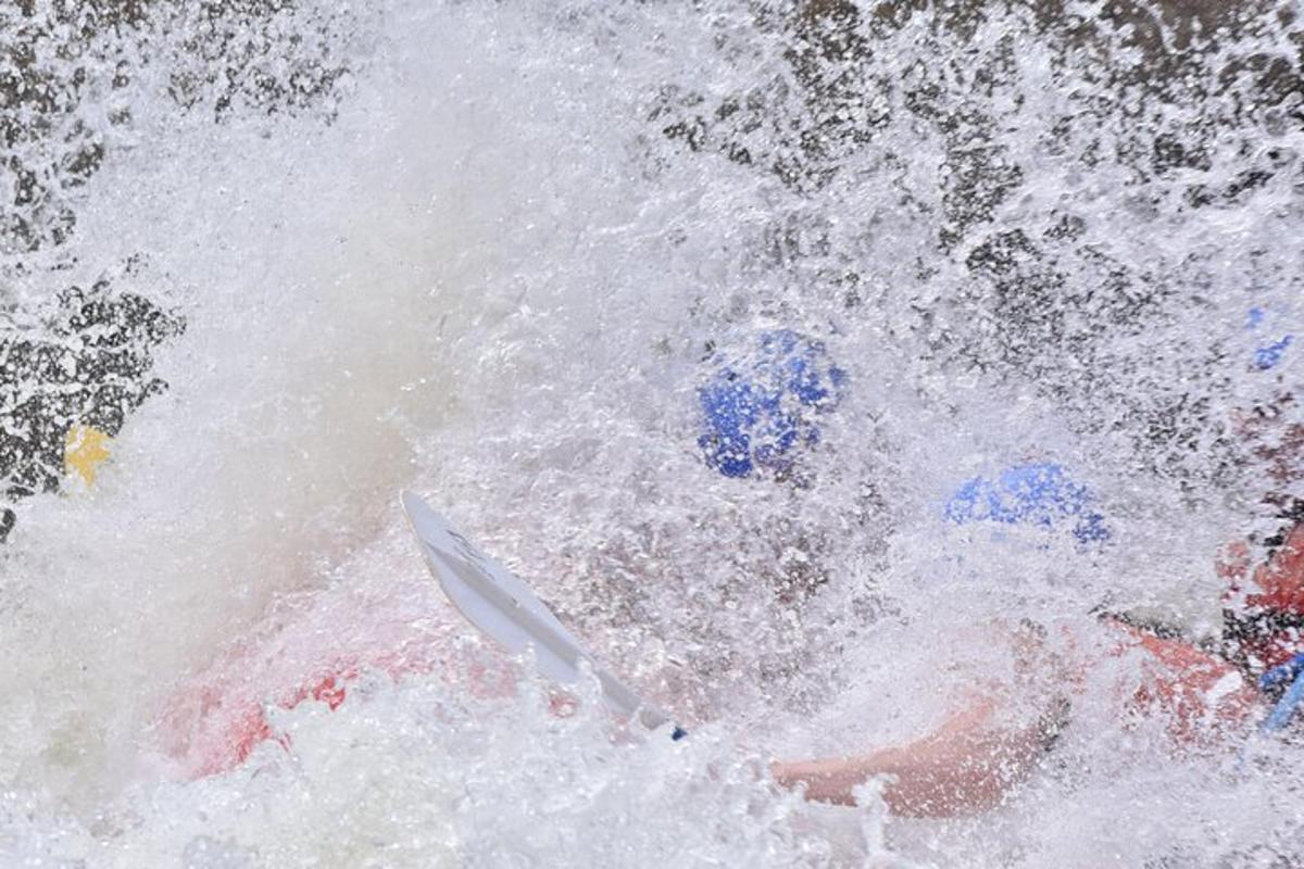 a person on a kayak in a body of water