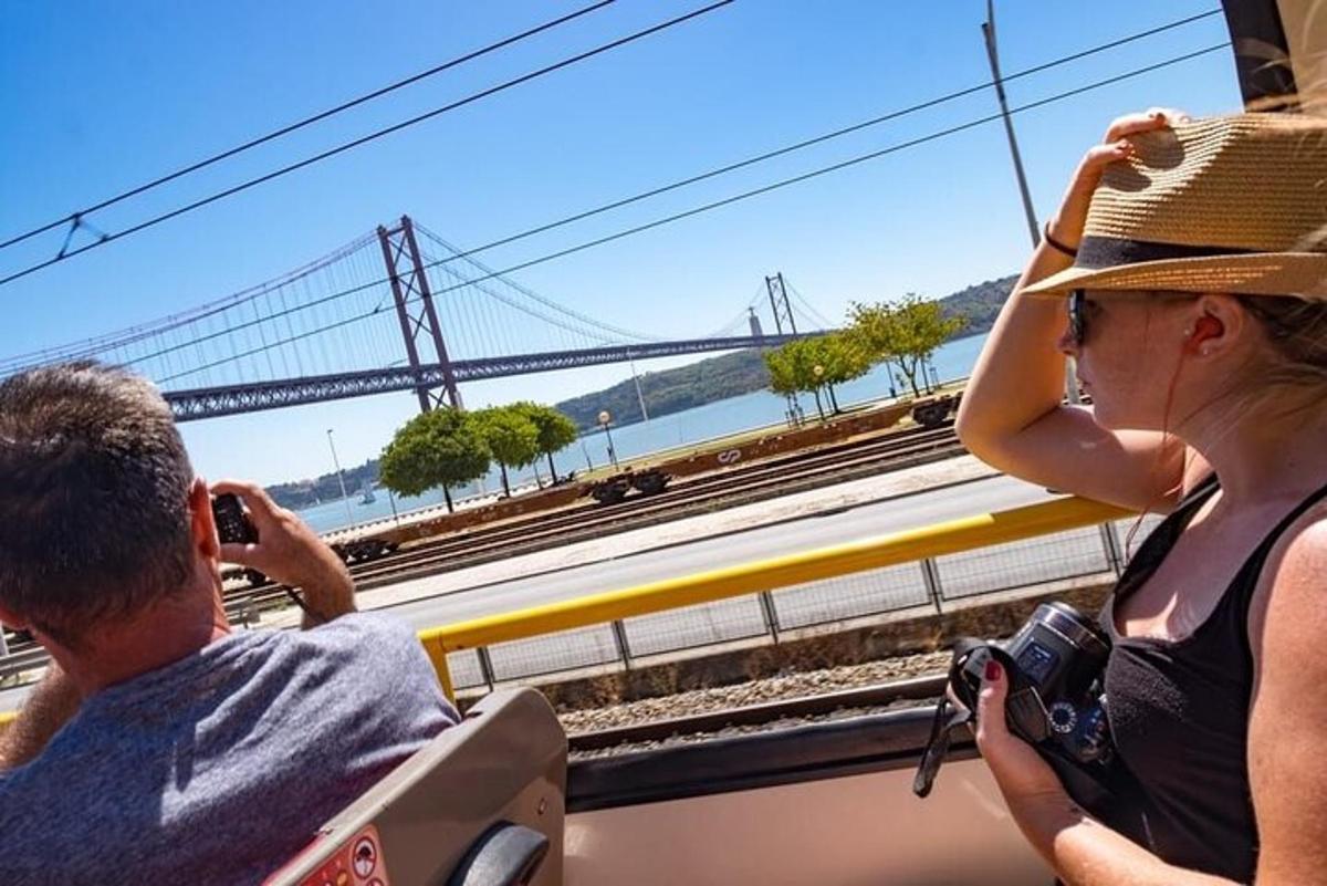 a man and a woman taking a picture on a train