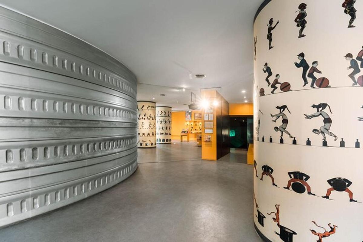 a room with a wall with images of people on it