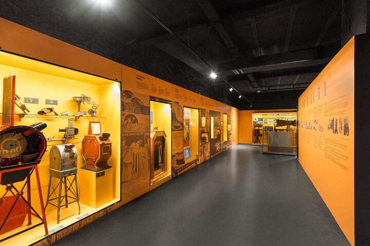 a hallway in a museum with lots of exhibits
