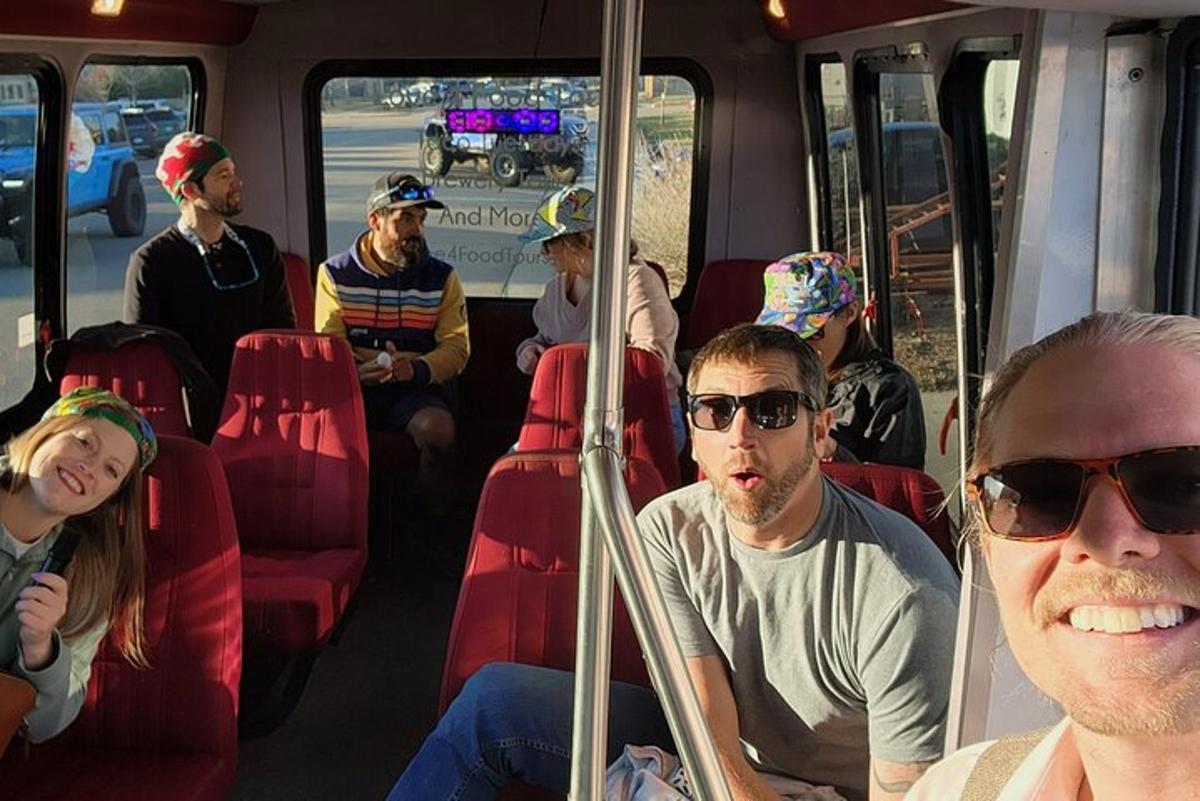 a group of people sitting on a bus