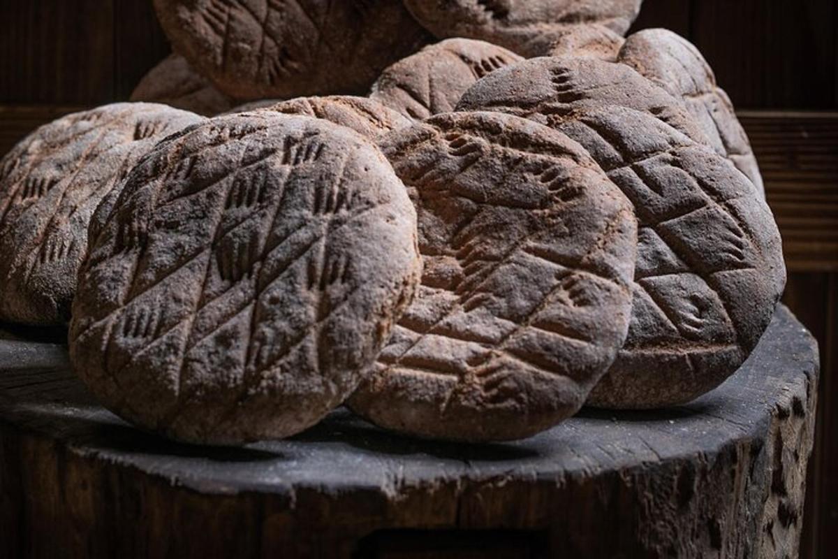 a pile of bread sitting on top of a table