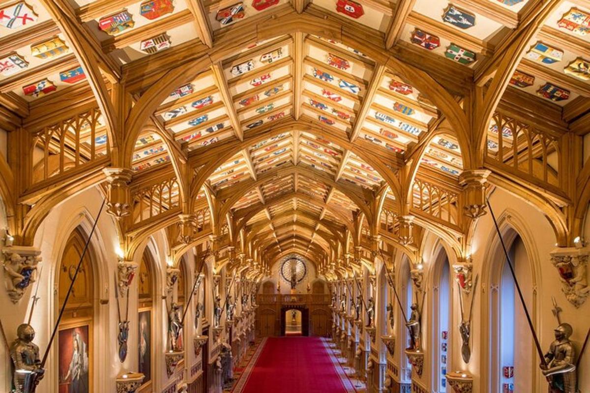 a large building with a wooden ceiling and a red carpet