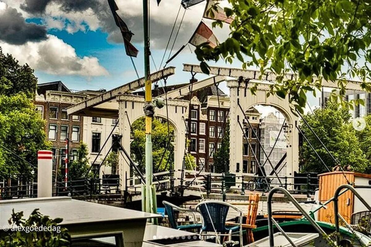 a patio with a table and chairs and a building