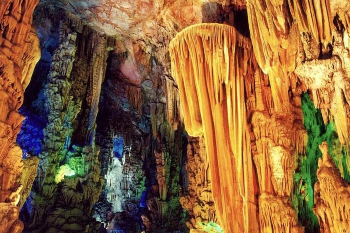 a cave with a painting on the wall