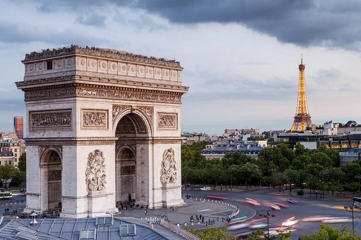 a large building with the eiffel tower in the background
