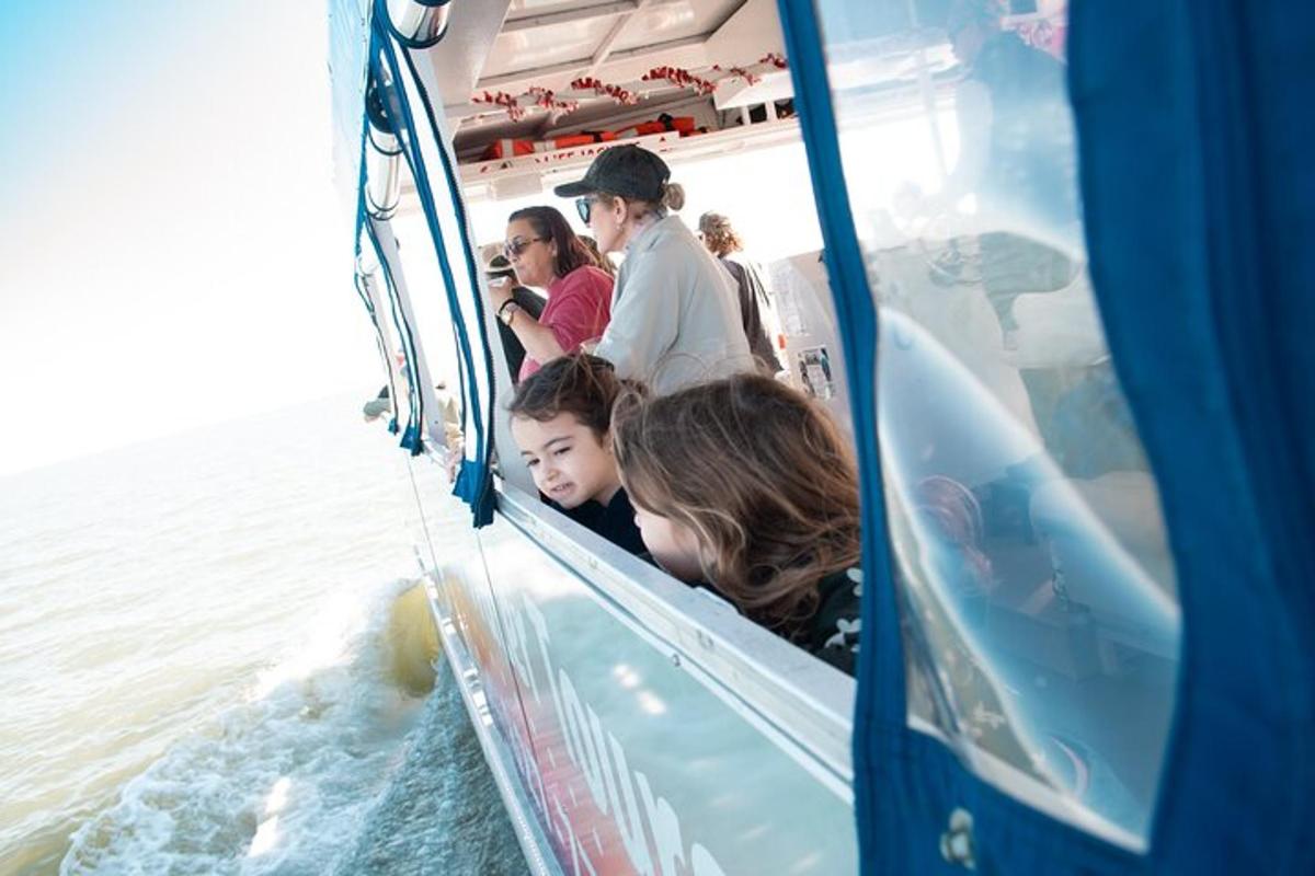 a group of people riding on a boat in the water