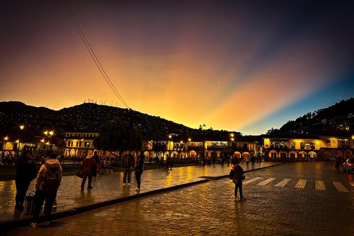 a group of people walking on a street with a rainbow in the sky