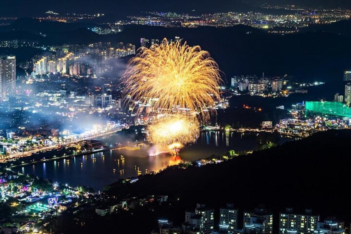 a fireworks display over a city at night