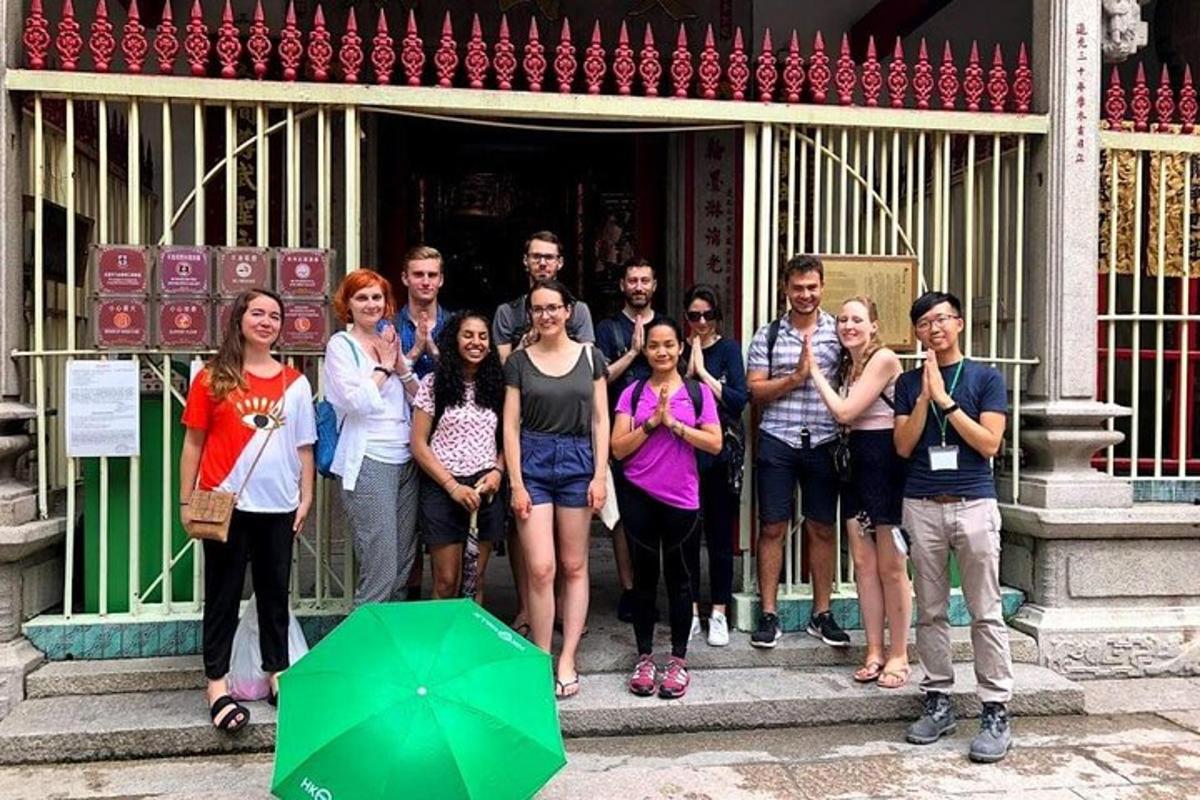 a group of people standing in front of a building