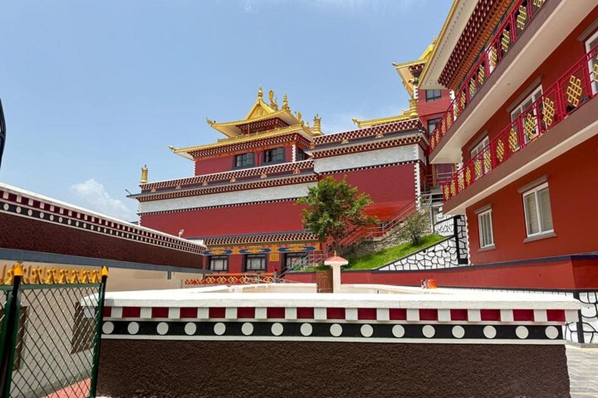 a large building with a tree in front of it
