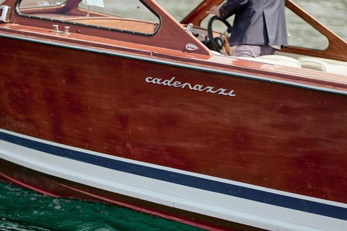 a man standing in a boat in the water