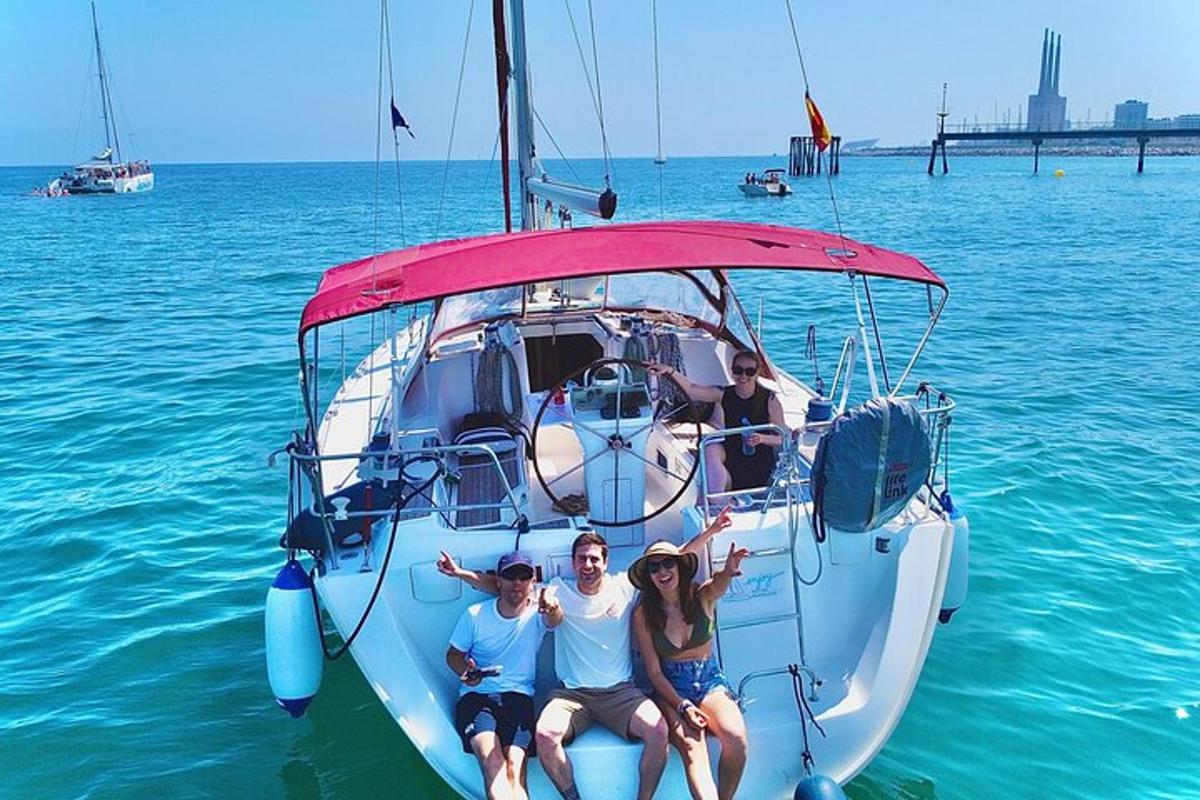 a group of people sitting on a boat in the water