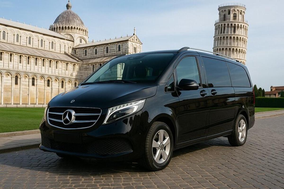 un furgone Mercedes Benz nero parcheggiato davanti a un edificio