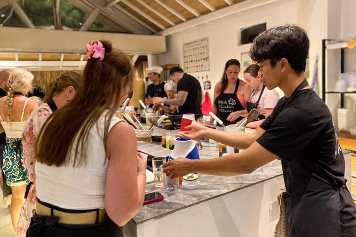 a man and a woman standing at a counter