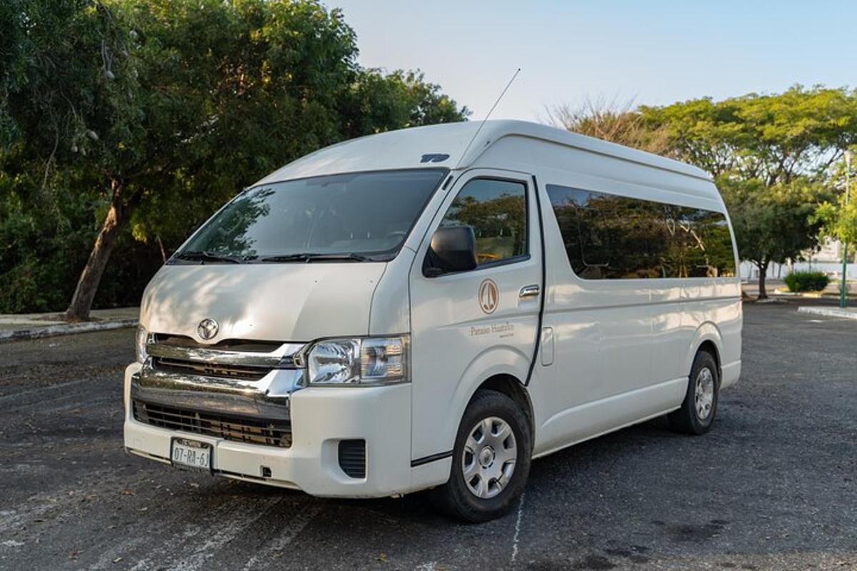 a white van parked in a parking lot