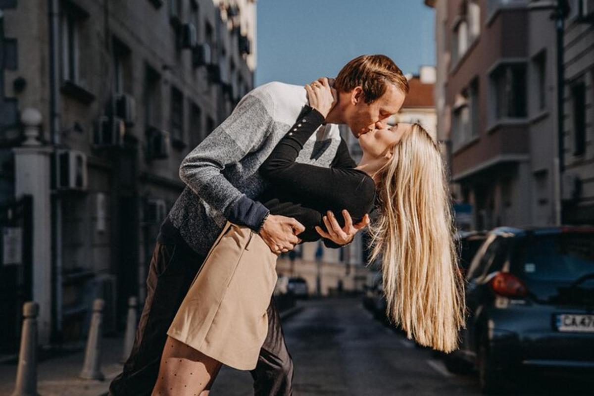 a man and a woman walking down a street