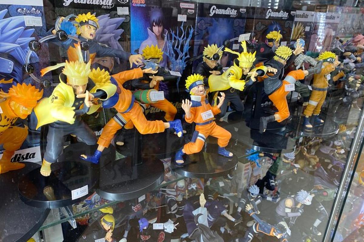 a group of toy figurines on display in a glass case