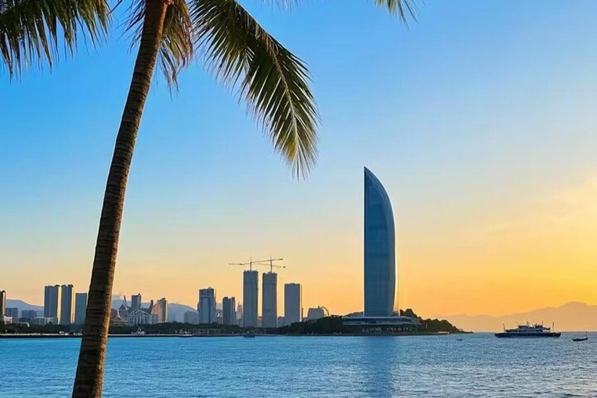 a view of a city skyline with a tall building