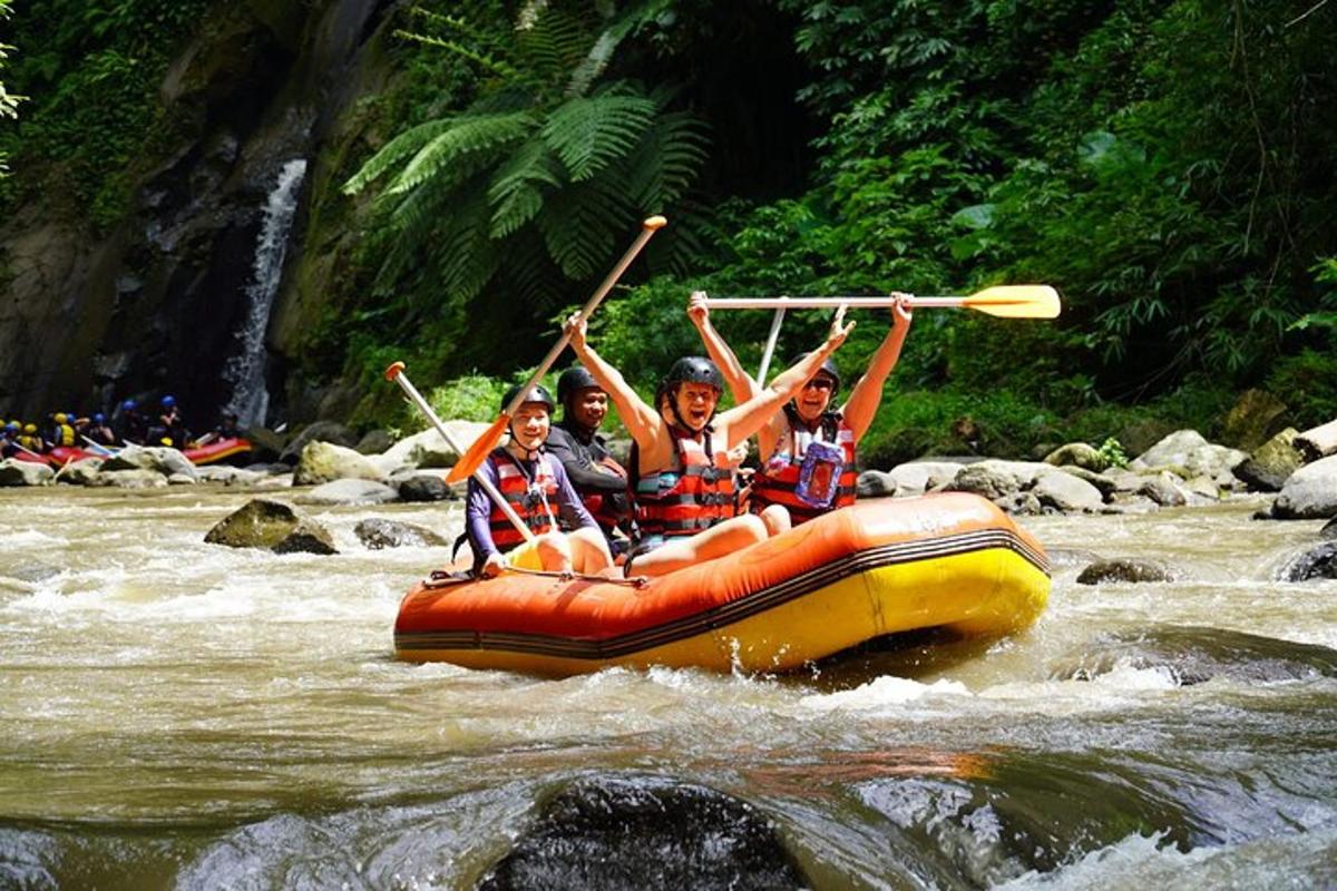 a group of people riding a raft in a river