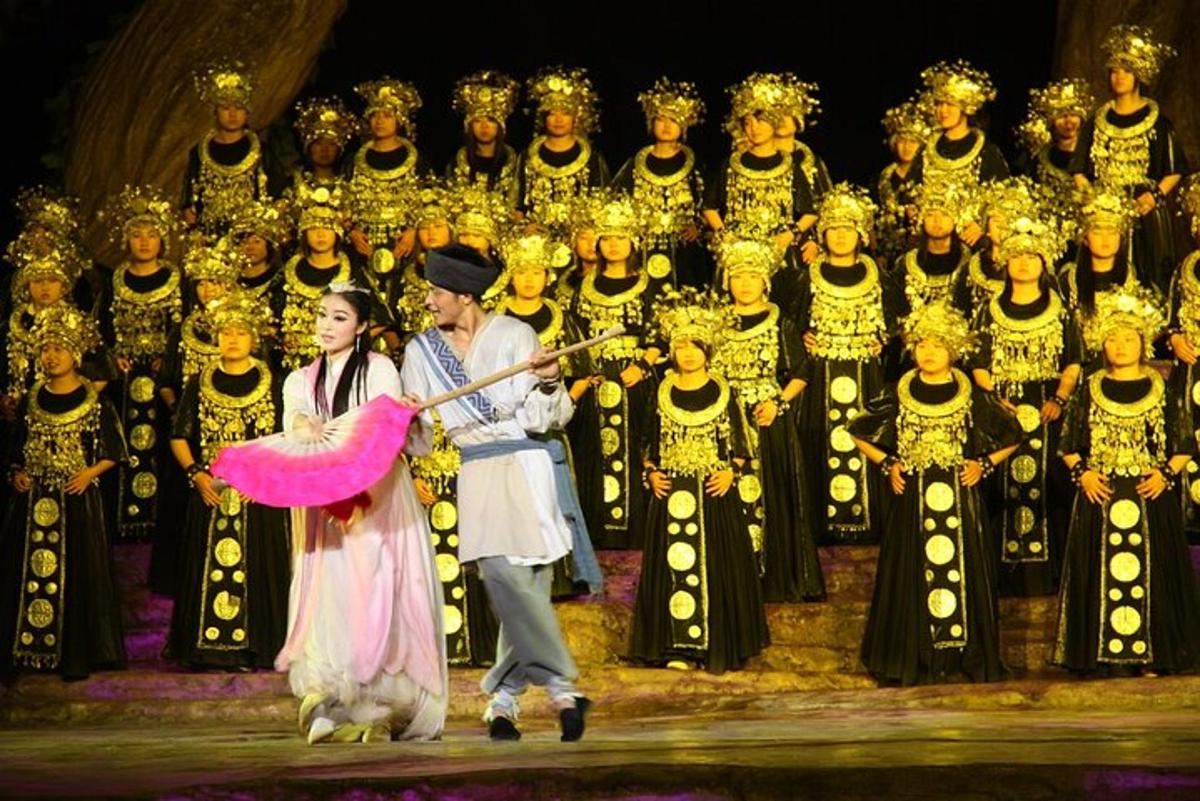 a man and woman playing a musical instrument on a stage