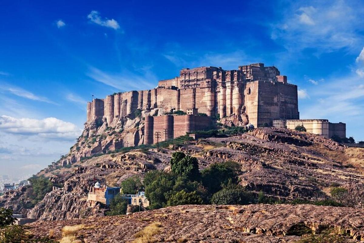 a large castle on top of a mountain