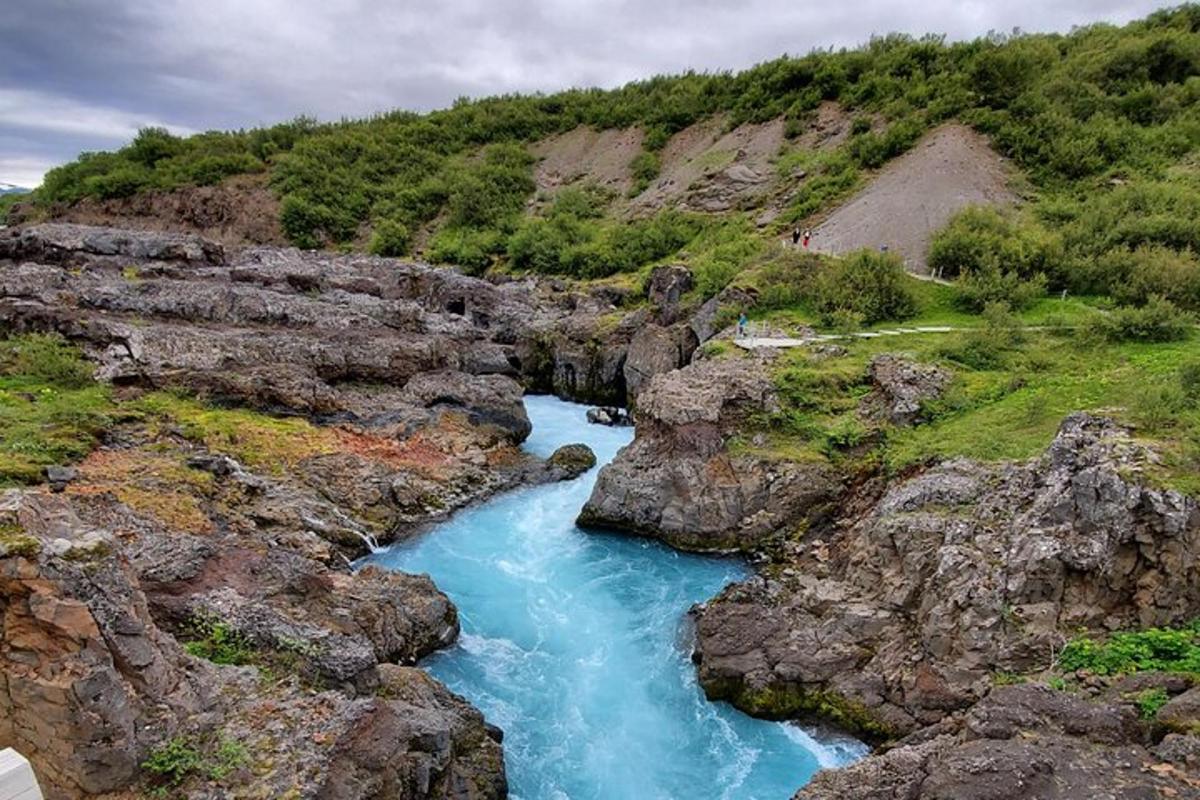 a river in the middle of a rocky canyon