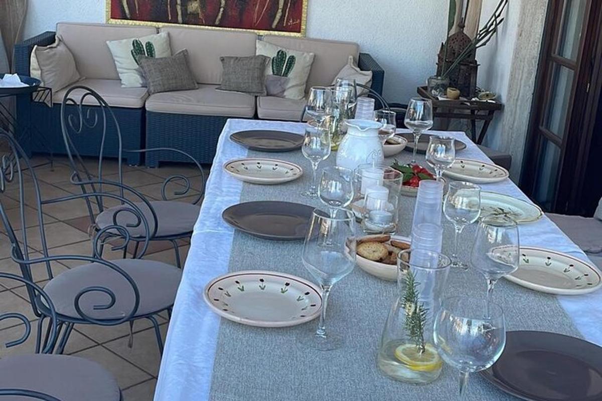a table with plates and wine glasses on it