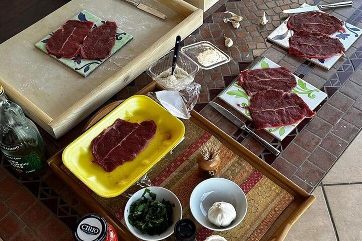 a table topped with slices of meat on plates