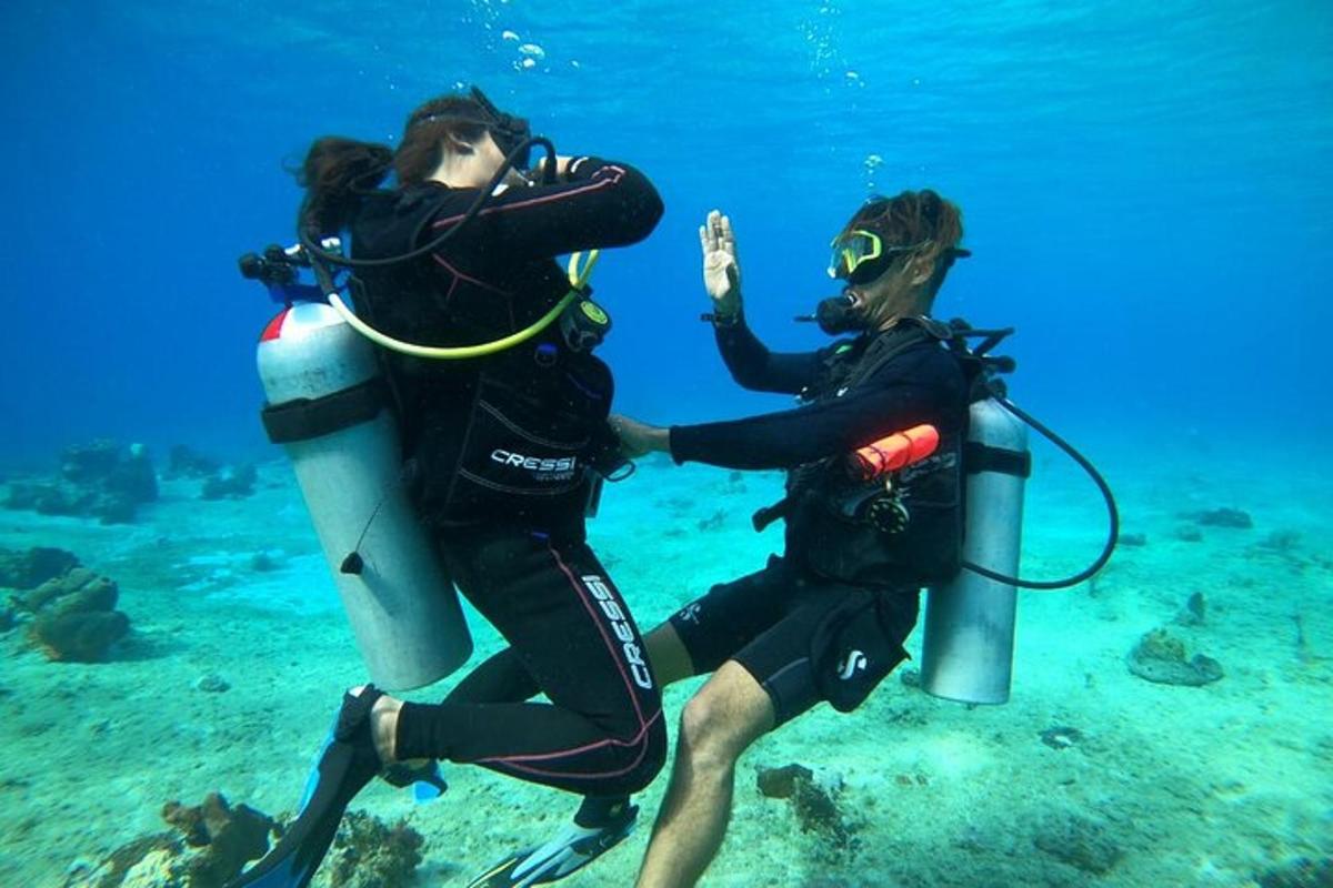 two people in the water in the ocean