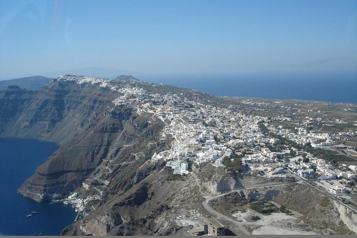 an aerial view of a city on top of a mountain