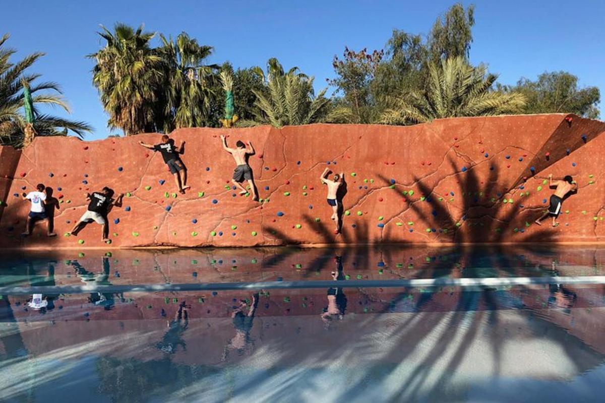 a mural of people jumping into the water