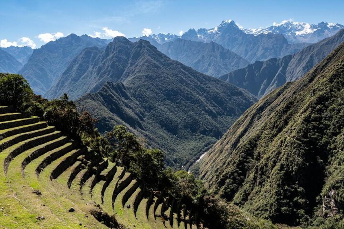 a view of a mountain with mountains in the background