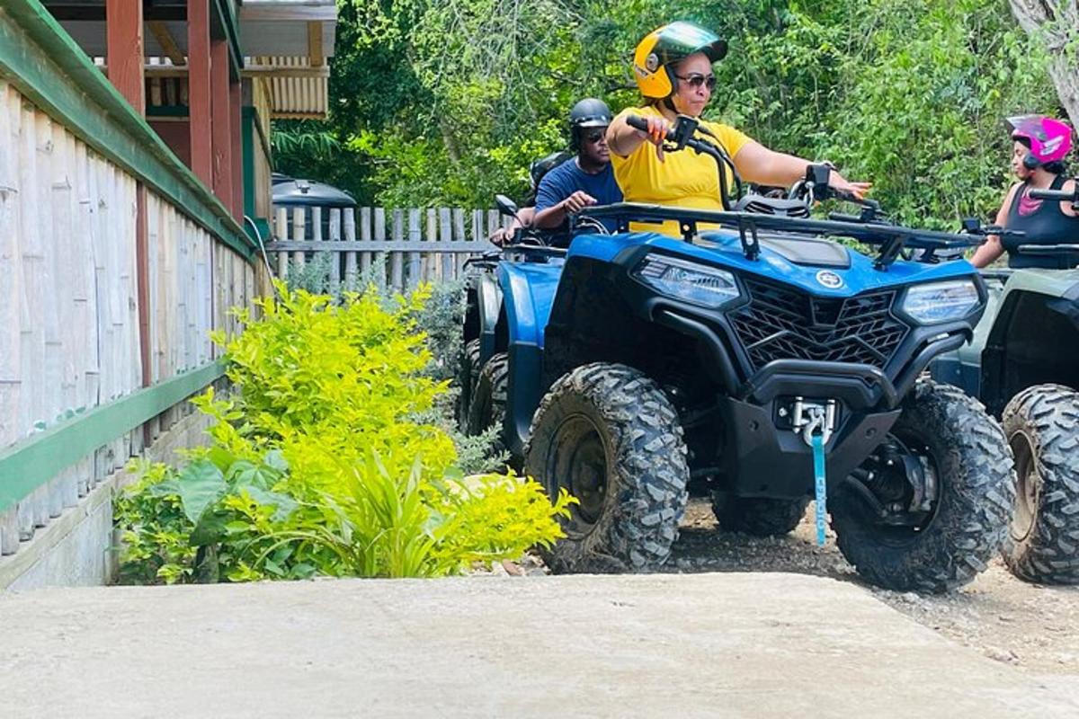 a group of people riding on atvs on a road