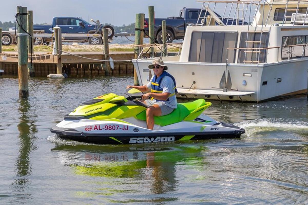 a man riding a jet ski in the water