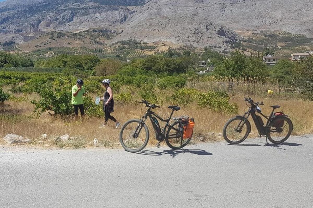 a couple of bikes parked on the side of a road