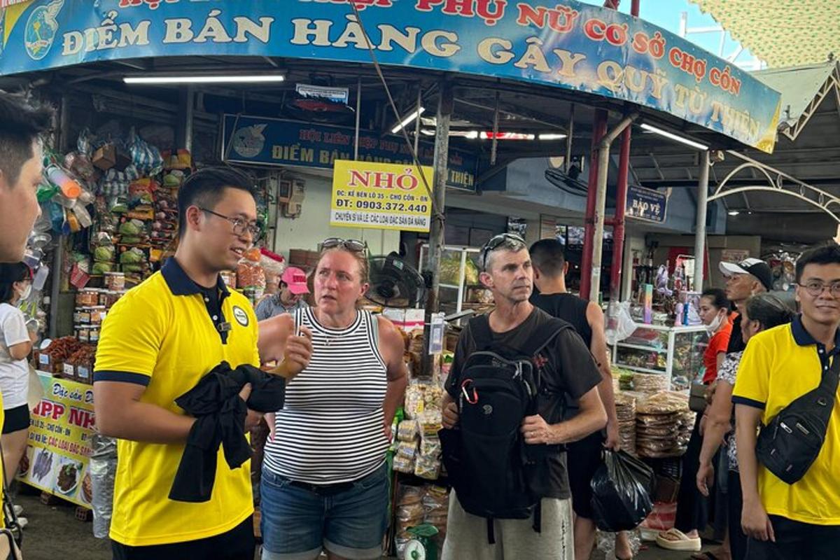 a group of people standing in a market